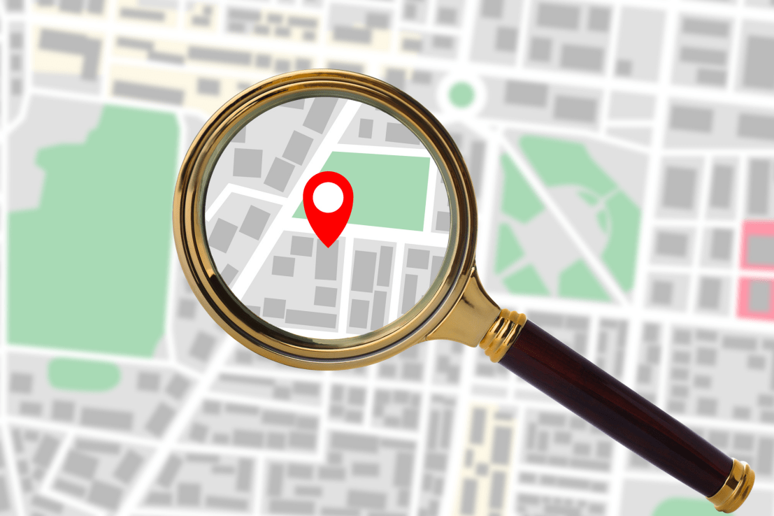 Magnifying glass over looking vectorised map